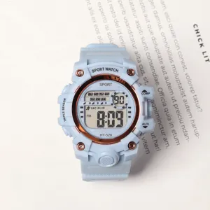 Detailed close-up of light blue sport digital watch, durable and casual style design.