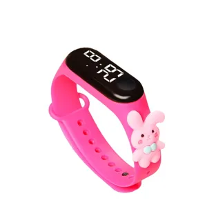 Cute pink silicone digital watch with lovely rabbit cartoon design for children daily wear.