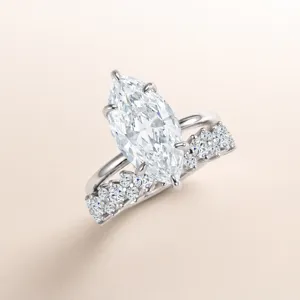 Elegant marquise-cut zircon ring set with sparkling pave bands for women luxury jewelry.