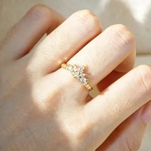 Close-up detail view of the elegant silver crown ring showcasing sparkling marquise cut stones.