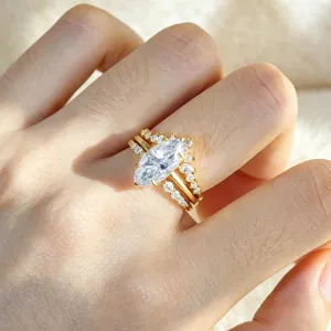Close-up detail of a stunning 2ct marquise moissanite stacking ring set in silver.