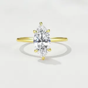 Marquise cut moissanite ring in gold tone 925 silver, elegant stackable ring detail shot.