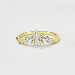 Close-up detail of the crown marquise moissanite ring, brilliant stone cutting and fine silver.