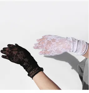 Eleganti guanti in pizzo a rete, maniche lunghe traspiranti per feste, nero e bianco.
