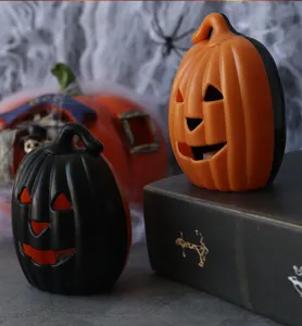Halloween LED electronic pumpkin lights, glowing jack-o-lantern decorations for party props.