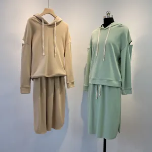Casual cotton long sleeve hooded sweatshirt and midi skirt two-piece set for women.