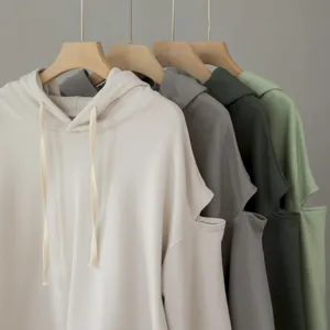 Casual loose-fit long sleeve hooded sweatshirt dress with trendy shoulder cut-outs.