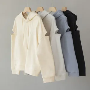 Casual loose fit hooded sweatshirt for women featuring stylish shoulder cutout long sleeves.
