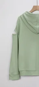 Sage green casual cotton hoodie with stylish cold-shoulder cutout design and long sleeves.
