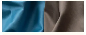 Gros plan détaillé de texture de tissu exquis montrant un matériau en coton haut de gamme.
