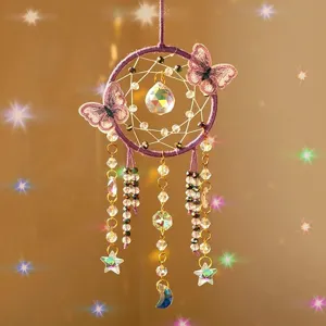Crystal suncatcher dreamcatcher with purple butterflies and hanging beads for indoor wall decor.