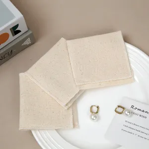 Bolsa de almacenamiento con solapa de algodón para joyas, embalaje de regalo vista principal.