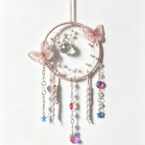 Pink crystal dreamcatcher suncatcher with lace butterflies and hanging crystal beads for home wall decor.