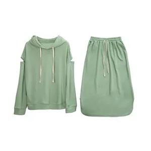 Casual sage green two-piece hoodie and skirt set, comfortable cotton loungewear for women.