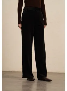 Detail view of women's black corduroy wide leg pants, casual high waist design, comfortable fit.