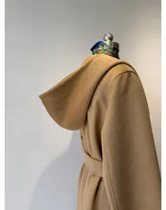 Camel hooded wool coat for women, elegant wrap design with matching belt for winter days.