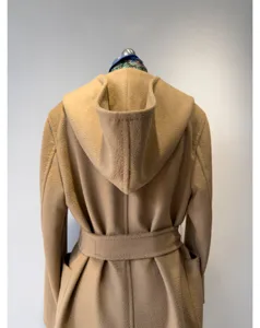 Camel hooded wool cashmere coat for women, elegant long wrap winter outerwear piece.