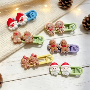 Cute Christmas gingerbread man and Santa hair clips detail showing colorful resin holiday accessories.