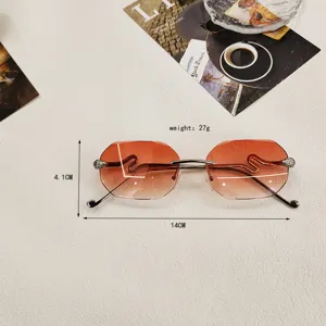 Stylish rimless gradient orange sunglasses with unique snake metal temples for women UV protection.