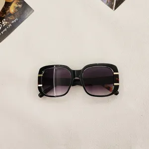 Trendy square sunglasses for men and women, featuring gradient lenses and chic metal accents.