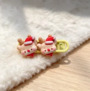Cute Christmas reindeer hair clip sweet side clip plush blanket background detail view