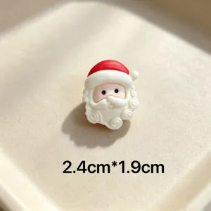 Cute resin Christmas Santa Claus charm brooch for holiday DIY decoration and accessories.