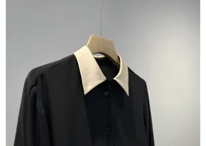 Black long sleeve shirt with contrast white collar, elegant chic top for women.