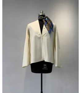 Cotton V-neck blouse detail, wide long sleeves, casual chic cream top view, minimalist style.