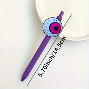 Vista detallada de primer plano del bolígrafo de gel morado creativo con diseño de ojo.