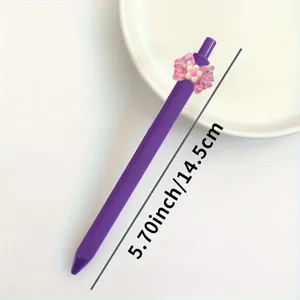 Purple gel pen with cute translucent bow and flower charm, 5.70 inch stationery writing tool.