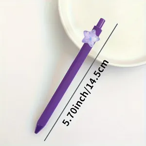Purple gel pen with cute resin glitter star charm, smooth writing school and office stationery.