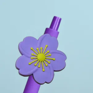 Detail view of the cute purple cherry blossom gel pen, perfect cute school stationery for kids.