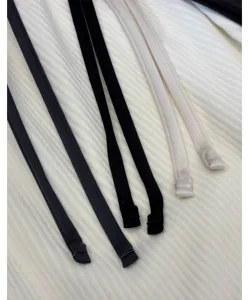 Close-up detail of adjustable clothing drawstrings, soft fabric and fine stitching design.