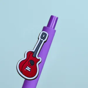 Purple gel pen featuring a cute red guitar charm, smooth writing school stationery gift.
