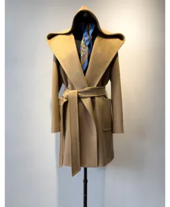 Elegant camel hooded wool coat for women featuring a wrap belt and classic winter style.