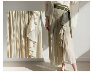 Close-up detail view showing pleated ruffle split skirt culottes fabric texture.