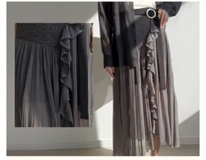 Gray pleated ruffle split midi skirt detail showcasing elastic smocked high waist design.