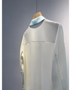 Elegant silk contrast collar shirt, smooth acetate fabric, minimalist design detail shot.