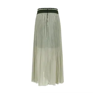 Pleated high waist midi skirt detail showing delicate folds and dark waistband.