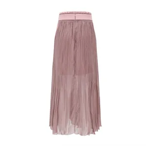 Details of the pleated high waist midi skirt, showcasing fine texture and elegant pink fabric.