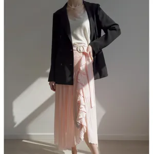 Detail view of high waist pleated ruffle split skirt, elegant Japanese style women's bottom.