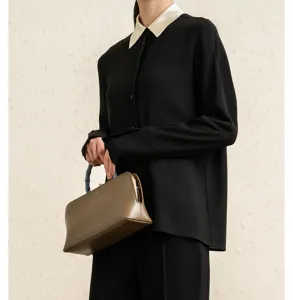 Elegant silk collar long sleeve black shirt detail showcasing premium fashion style lookbook.