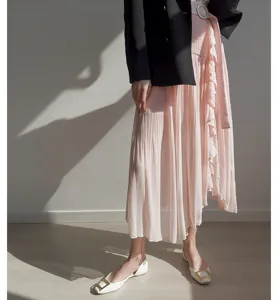 Pink pleated midi skirt detail, high waist ruffle split design, elegant women's apparel.