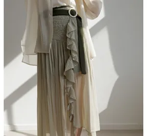 High waist pleated midi split skirt detailed with delicate ruffles and chic olive belt.