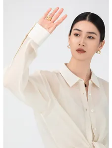 Sheer organza blouse for women, lightweight long sleeve button-down shirt for summer daily wear.