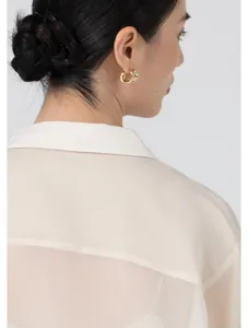 Sheer acetate organza shirt detail, lightweight breezy fabric, elegant back view.