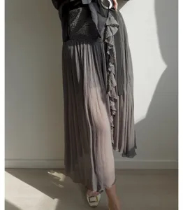 Detailed view of women high waist grey pleated ruffle split skirt, stylish midi culottes.