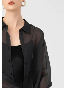 Sheer black acetate organza button-up shirt detail, lightweight summer sun protection cardigan.