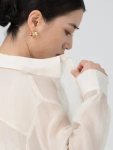 Translucent organza blouse for women, lightweight summer sun protection shirt with long sleeves.