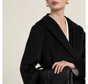 Elegant black hooded wool coat for women, premium winter outerwear fashion style.